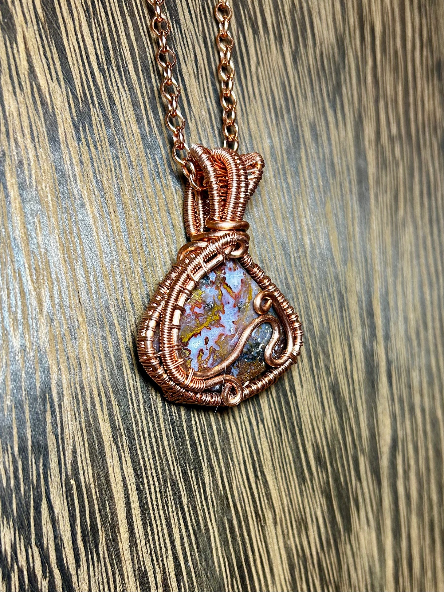 Red Moss Agate Wrapped In Copper Wire.