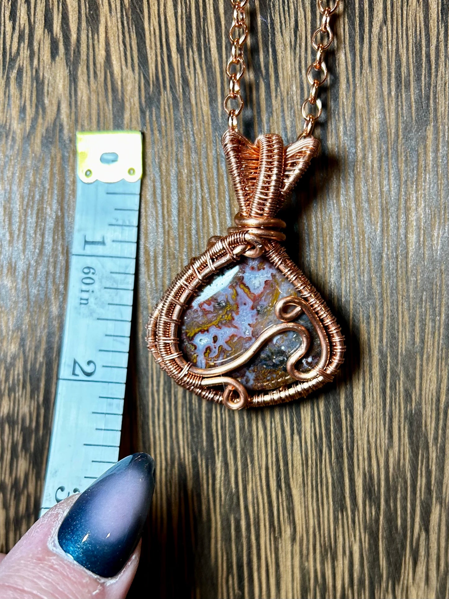 Red Moss Agate Wrapped In Copper Wire.