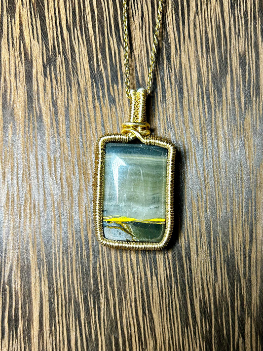 Bumblebee Jasper Wrapped In Gold Colored Wiring