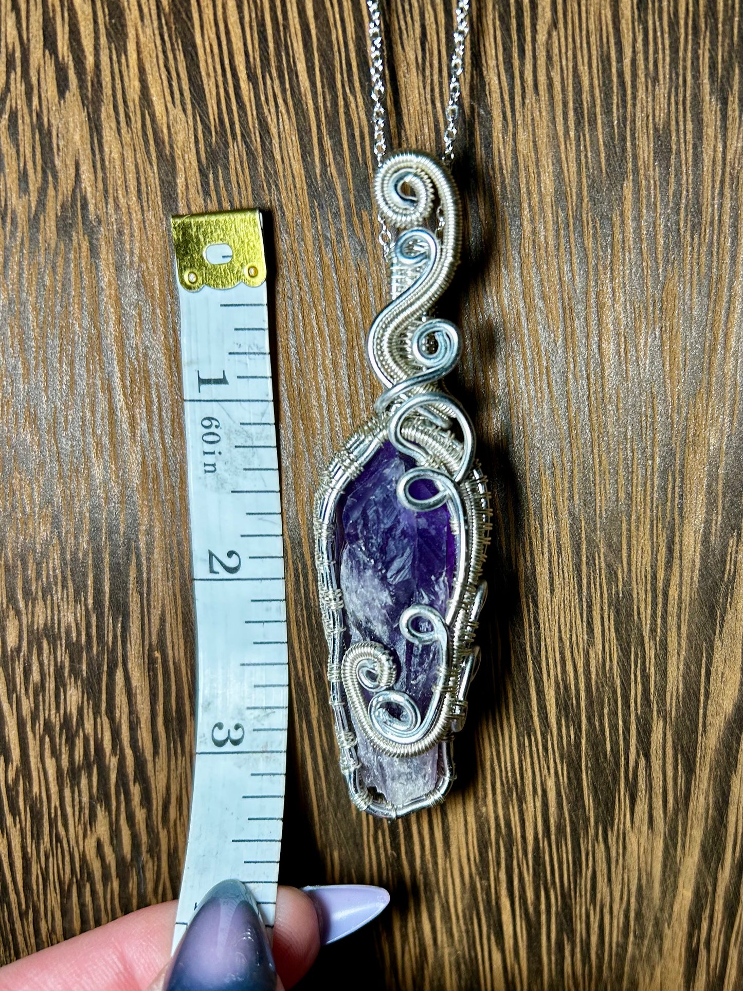 Bahia Amethyst Wrapped In Silver Colored Wiring