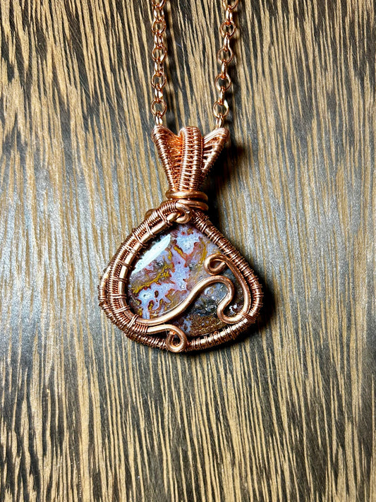 Red Moss Agate Wrapped In Copper Wire.