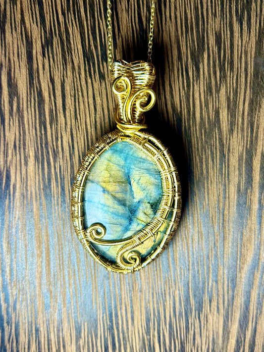 Labradorite Wrapped In Gold Colored Wiring