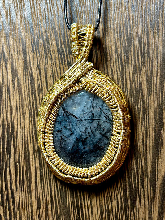 Tourmalated Quartz Wrapped In Gold Colored Wiring